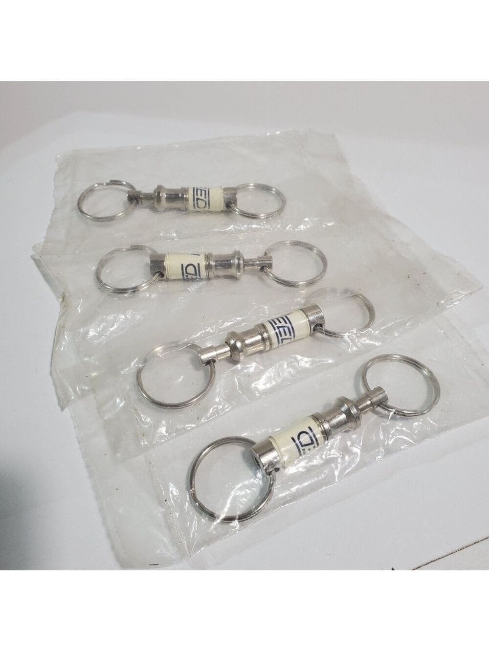 Sealed Lot of 4 REED quick release keychains advertising star RReed